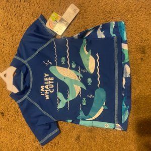 Size 2t swin trunk set with shirt.